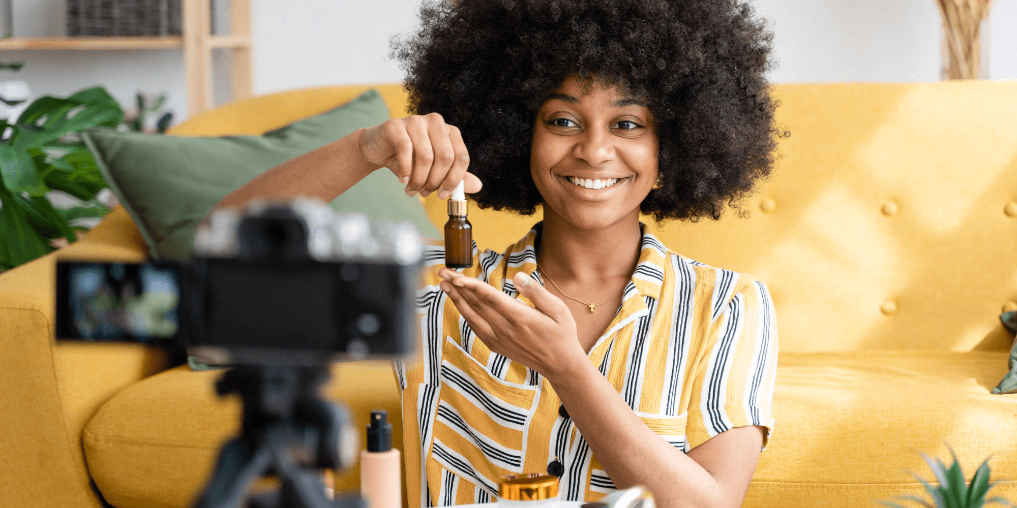 Influencer holding a branded supplement bottle in a lifestyle setting, illustrating the rise of creator-led private label wellness products