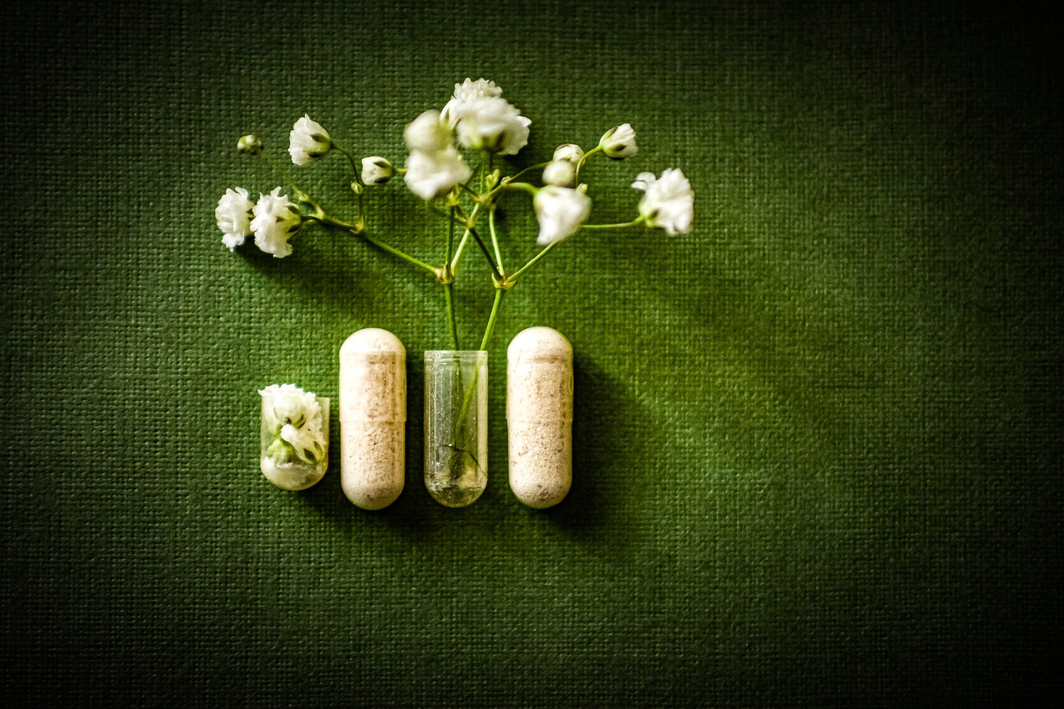 pills and vitamins on yellow background