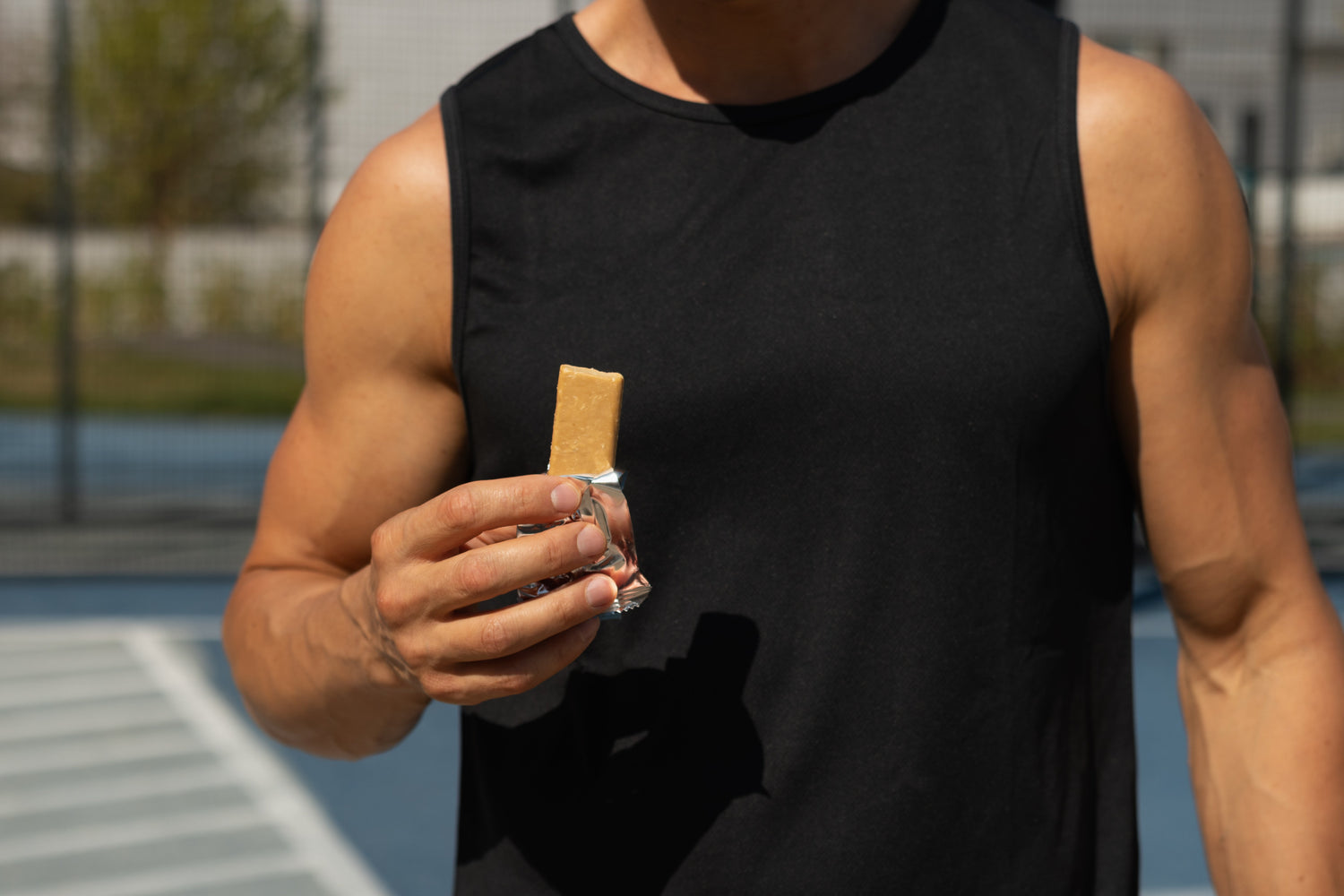 "Functional protein bars with added prebiotics, nootropics, and collagen displayed on a neutral surface, showcasing wellness-forward snack trends."